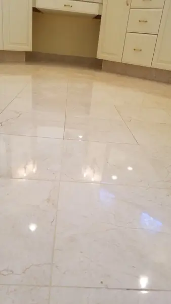 Freshly restored high-gloss marble entry floor in a Coachella Valley home